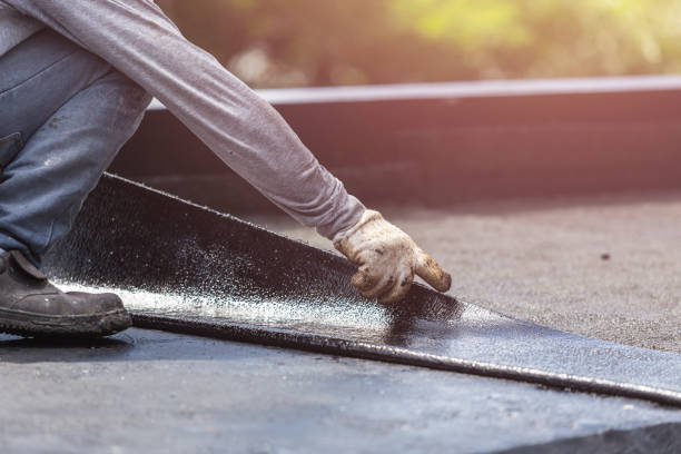 Professional Basement Waterproofing technician working in Lima, NY